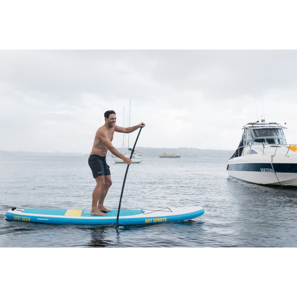 Man on 10'8 Seek SUP board