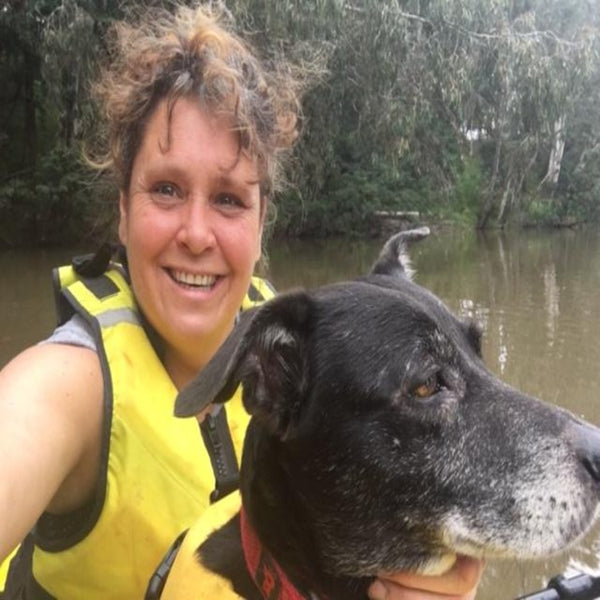 Lady and her dog on Bighead kayak