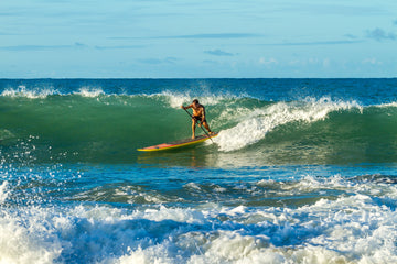 How to catch a wave on your stand up paddle board