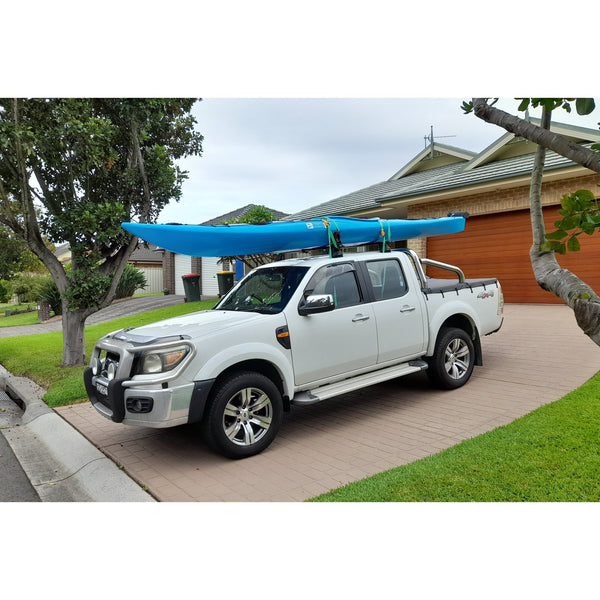 Expedition Zero 5m sit in sea kayak in Aqua on car roof racks