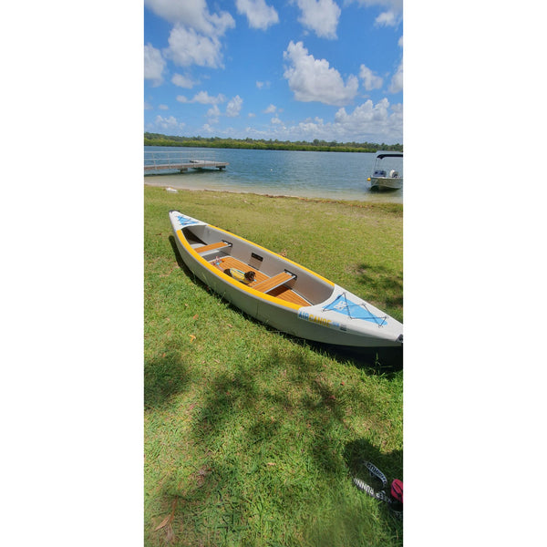 inflatable_drop_stitch_air_canoe_on_land_grass