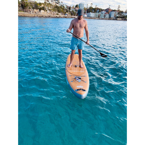 Guy on Bay Sports 11'6 Wood Look Inflatable Stand Up Paddle Board 2